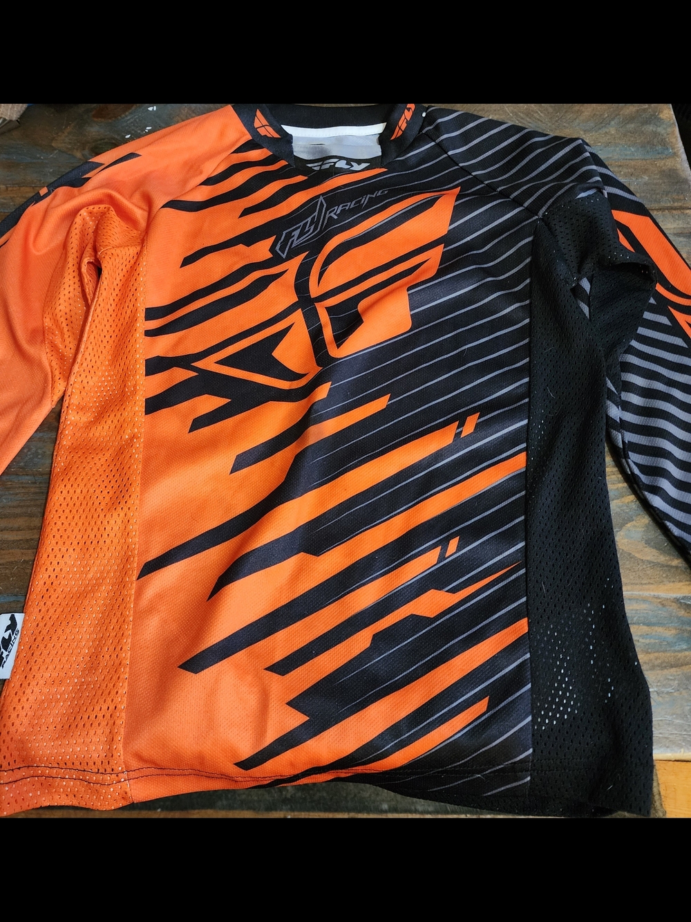 Fly Racing Orange and Black Motocross Jersey SizeYouth Medium, Long Sleeve
